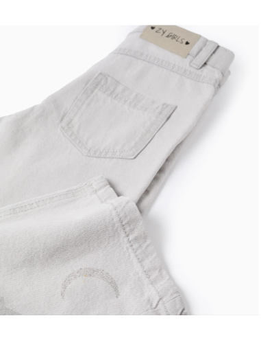 Vaqueros con estampado de estrellas y lunas...